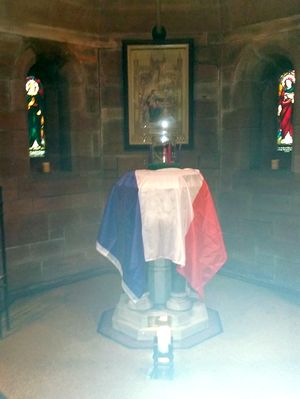 The French flag draped over the font at All Saints on November 15.